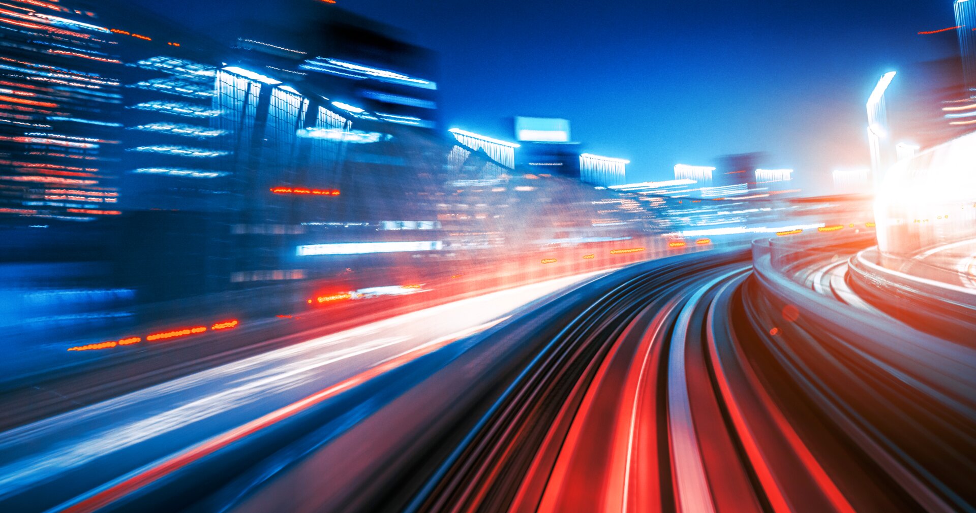 © iStock-962650288_Nikada (High Speed Motion Blur driving through a tunnel at night Futuristic High Speed Monorail Train Tokyo, Japan)